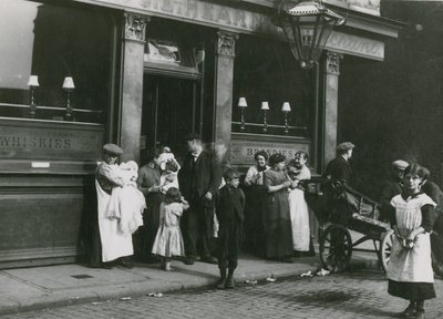 Men, Women and Children Outside a London Tavern by English Photographer